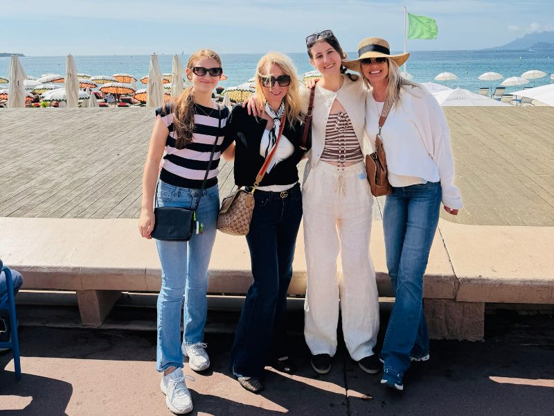 12 (Cannes) Us ladies posing at a beach club in Cannes